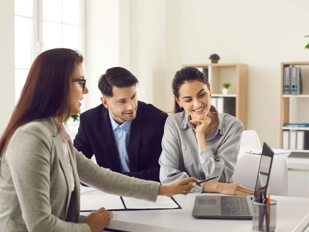 A property manager showing her client the latest rental inspection report.